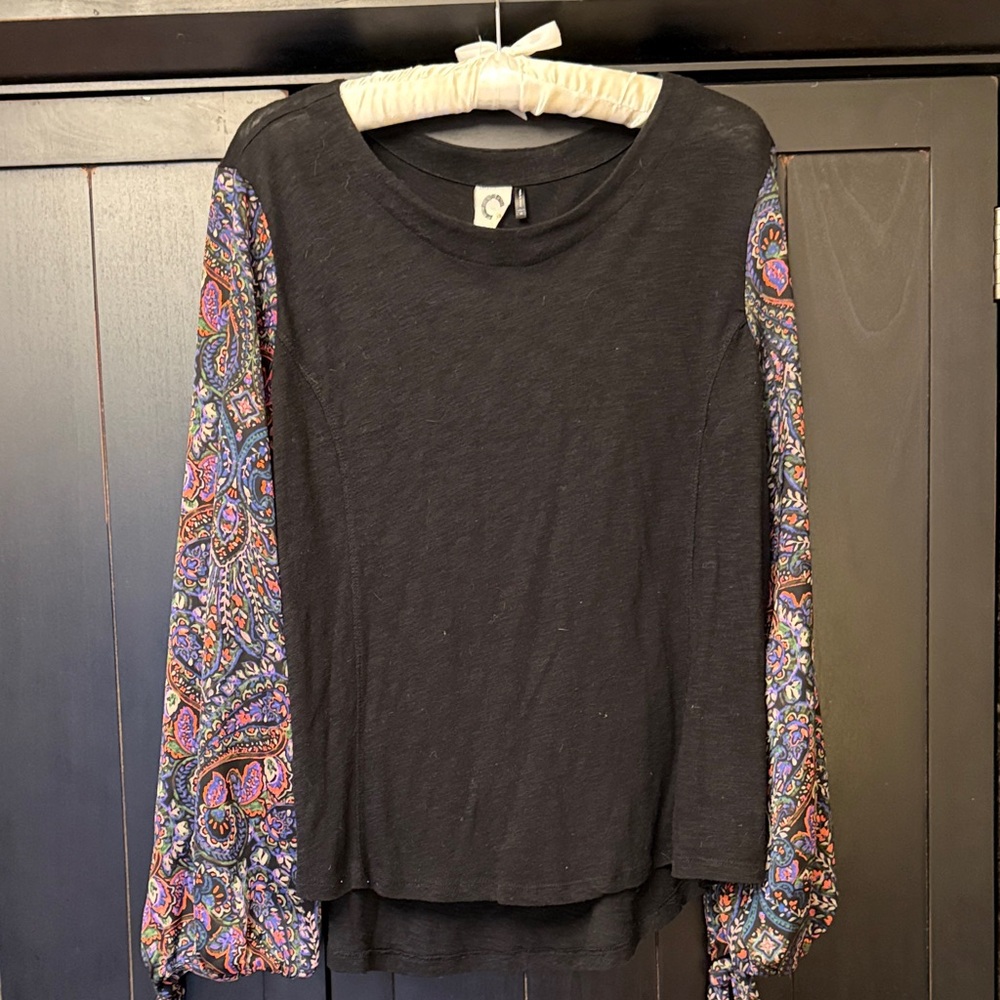 Elegant Black Top with Paisley Sleeves